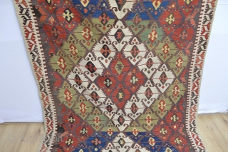 This Beautiful as found Antique Anatolian Kilim Probably Sivrihisar area has all natural colors and very good heavy feeling soft wool some spots of small old repairs.. very colorful and designful 
  ...