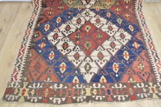 This Beautiful as found Antique Anatolian Kilim Probably Sivrihisar area has all natural colors and very good heavy feeling soft wool some spots of small old repairs.. very colorful and designful 
  ...