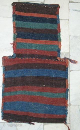 North West Of Persia
Kurd Tribal Sannjabi area,all wool needle work( Ladi style)salt bag
circa 1940,in mint condition size 0.68cm x 0.38cm.
all natural colors           