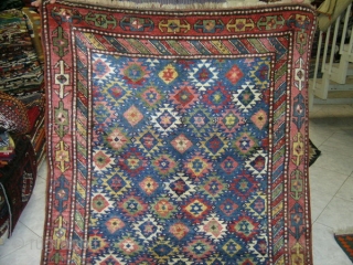 Persian Carpet 
North East Iran Kurd Ghochan Tribal 
All wool in full pile Star design Ghoochan carpet
Size 235cmx130cm circa 1920,all natural colors
mint condition,no ends or sides missings      