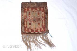 Dagistan kilim bag,nice leather  figure behind it early 20 century
size:28 x 34 cm
        14 x11 inches         