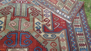 Old perez shield kazak design rug. Some areas of low pile and slight wear. Sides over woolled. Very attractive rug. 7ft 2' x 5 ft 8' (220cm x 123cm). £1500 o.n.o. plus  ...