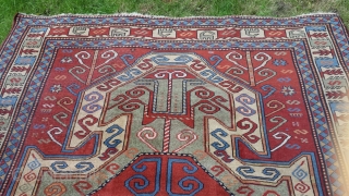 Old perez shield kazak design rug. Some areas of low pile and slight wear. Sides over woolled. Very attractive rug. 7ft 2' x 5 ft 8' (220cm x 123cm). £1500 o.n.o. plus  ...