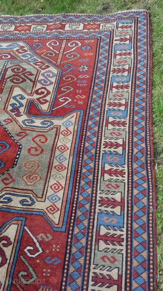 Old perez shield kazak design rug. Some areas of low pile and slight wear. Sides over woolled. Very attractive rug. 7ft 2' x 5 ft 8' (220cm x 123cm). £1500 o.n.o. plus  ...