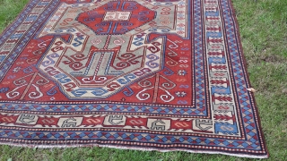 Old perez shield kazak design rug. Some areas of low pile and slight wear. Sides over woolled. Very attractive rug. 7ft 2' x 5 ft 8' (220cm x 123cm). £1500 o.n.o. plus  ...