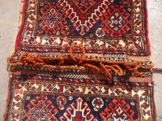 Very fine complete Qashqai Khorjin with great shiny wool and all good colors,good age and excellent conditio.Original kilim backing and tassels.Size 3'7"*1'7".E.mail for more info and pics.

      