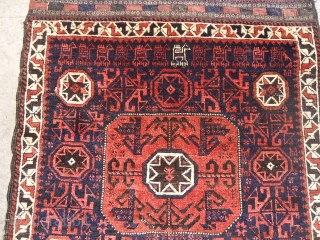 Very rare and beautiful Baluch Bagface with runing dogs and goats, all good colors,without any repair done.good age,Fine weave and unusual design.Size 2'4'*2'4".E.mail for more info.       