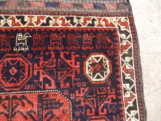 Very rare and beautiful Baluch Bagface with runing dogs and goats, all good colors,without any repair done.good age,Fine weave and unusual design.Size 2'4'*2'4".E.mail for more info.       