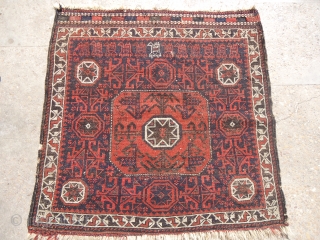 Very rare and beautiful Baluch Bagface with runing dogs and goats, all good colors,without any repair done.good age,Fine weave and unusual design.Size 2'4'*2'4".E.mail for more info.       