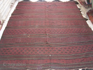 An ealy Baluch Flatweave Kilim,very supereb desigen,very fine weave good colours,Some old repairs,Size 7'1"*5'4".E.mail for more info,Please see other itmes also.            