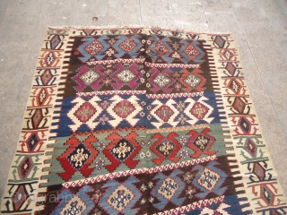 Anatolian Kilim with good age and great natural colors,fine weave,some old repair done,All beautiful colors and a very nice design.Size 10'7"*5'6".E.mail for more info and pics.       