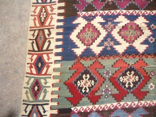 Anatolian Kilim with good age and great natural colors,fine weave,some old repair done,All beautiful colors and a very nice design.Size 10'7"*5'6".E.mail for more info and pics.       