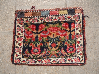 Afshar Chanteh with rich narul dyes and beautiful birds and vase unusal design.Orignal backing,very nice pce with energetic colors.Size 1'4"*1'1". E.mail for more info.         