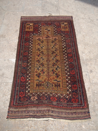 Early Baluch Prayer Rug with Silk Highlights,beauitful colors and design,Obivous condition.Size 5*2'10".E.mail for more info.                  