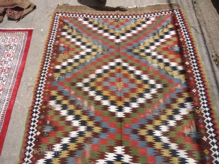 Antique Qashqai Kilim with Eye-Dazzler desigen,all good natrul colors,very fine weave,beautiful pce with good age,As found without any work done,Size 8'6"*5'3".E.mail for more info.         