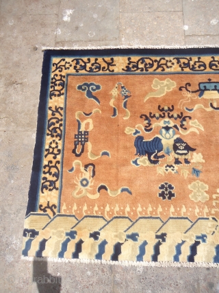 Tibet or Chinese seating rug with two dragons in the middle and beautiful design,fine weave,all good colors and fine weave.Good age,Size 5*3ft.E.mail for more info and pics.      