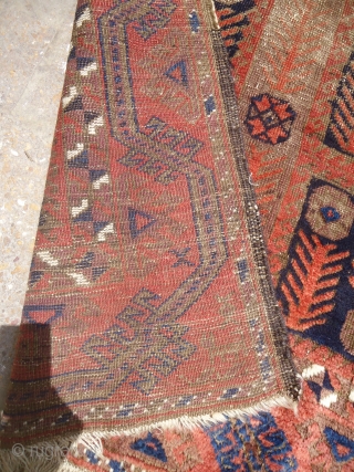 Baluch Rug with unusual design,all original condition just oxidation to black,no repair or work done,all natural colors,nice weave and age.Size 5'4"*3'11".E.mail for more info and pics.       