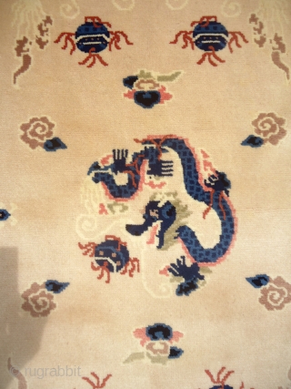 Chinese or Chinese Rug with five dragons,beautiful colors and unusual Ivory field,excellent condition,without any repair or work done.All nice colors,fine weave,Size 4'6"*2'3".E.mail for more info and pics.      