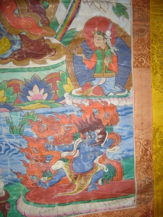 Tibetan oil painting on canvas,beautiful colours and nice work,Beautiful pce of art,fine condition.Size of canvas 2'6"*1'9",all over size 4'3"*2'9".E.mail for more info.           