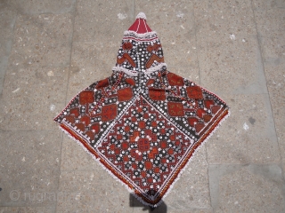 Women Wedding Dress cap ?.From Kohistan valley,Silk thread work on cotton cloth,very fine and beautiful work.E.mail for more info and pics.            