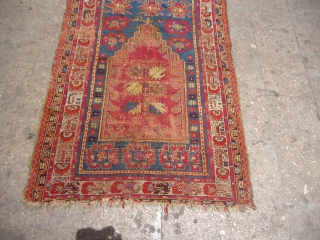 Early Anatolian Prayer Rug,fragmently condition,all natural colors,very nice design,As found.Size 5'5"*3'8".E.mail for more info and pics.                 