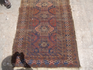 Baluch Rug with worn condition but good age and colors.Fine weave,Size 6'3"*3'7".E.mail for more info and pics,                