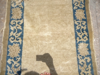 Chinese Rug with very early age,beautiful ivory ground.As found without any repair or work done.Size 4'10"*2'8".E.mail for more info and pics.            