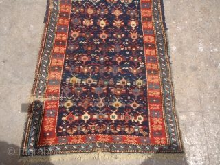 Caucasian Rug with great natural colors and age,as found without any repair or work done,beautiful design.Size 4'10"*2'10".E.mail for more info and pics.           