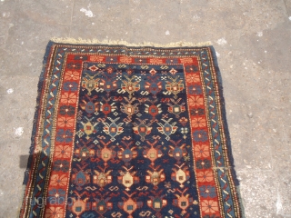Caucasian Rug with great natural colors and age,as found without any repair or work done,beautiful design.Size 4'10"*2'10".E.mail for more info and pics.           