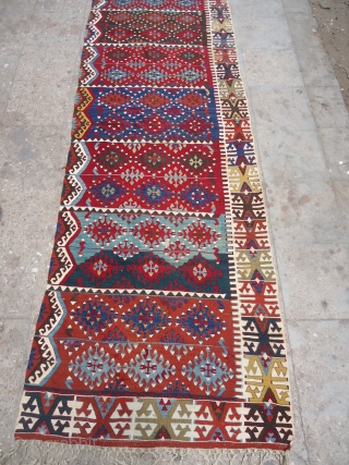 Anatolian Kilim pannel with great natural colors and a beautiful desigen,very fine weave,Very attractive pce with great colors and beauty.Size 12'9"*2'10".E.mailf for more info and pics.
       