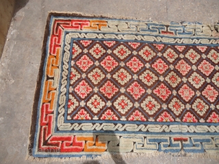 Beautiful Chinese seating rug with early age and as found condition,nice colors and design,without any work done.Size 5'6"*2'10".E.mail for more info and pics,          