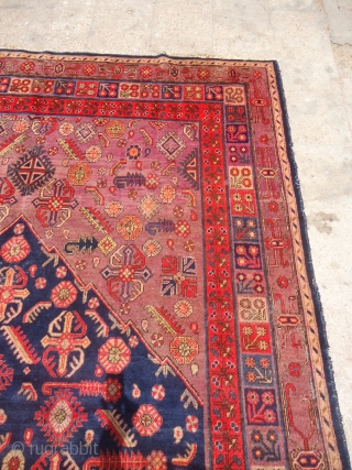 Khotan Rug with beautiful colors and desigen,very good condition without any repairs,Rare large size,very nice desigen,good age.Size 13'4"*6'10".E.mail for more info and pics.          