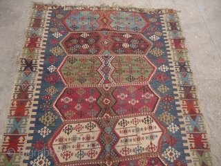 Anatolian Kilim with great natural colors and beautiful design,fine weave and and nice condition.Good age ,very beautiful pce.Size 10'1"*5'9".E.mail for more info and pics.         