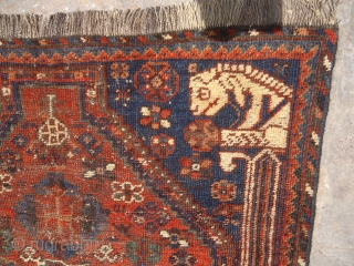 Qashqai or Shiraz Rug with four Lions each or every corner,all original without any repair or work done.Beautiful rug but worn.All natural colors.Size 4'5"*3'1".E.mail for more info and pics.    