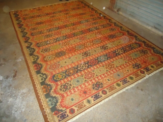 Dagestan Kilim,with very nice colours and desigen.Good condition.Size 12*8'3".E.mail for more info.                     