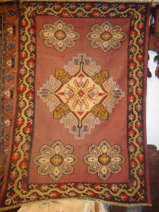 Azerbaijan Kilim,with beautiful desigen and some synthetic colours,good condition.Size 7'6"*5'6".E.mail for more info.                    