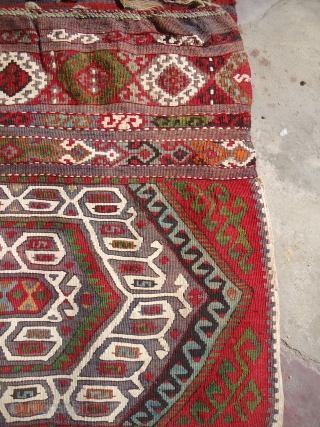 Eastern Anatolian heybe (double bag)from the Malatya region with metal threads,beautiful colours and very fine weave,all good colours,good age,very good condition,Size 4'10"*2'2".E.mail for more info.        
