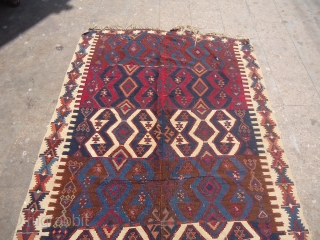 Aksaray Kilim with great natural colors and early age,very nice design,fine weave and all natural colors,As fond without any repair or work done.Size 9'5"*5'2".E.mail for more info and pics.    