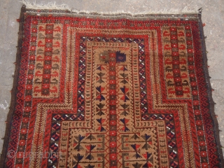 Camel ground Baluch Prayer Rug with great weave and dyes,both sides ends with kilim,very elegant design,excellent condition,all natural colors,very soft wool.Without any repair or work done.Size 4'11"*2'7".E.mail for more info and pics. 