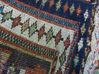 Great Kurd bagface with great colors and weave. It has has mostly a thick pile with a few small areas that are a little lower        