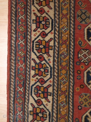 Antique Qashqai rug with triple medallion design, the medallions contain a large scale heratti design, this also has elements repeated in the field. 

Circa 1900.

There are also many small birds, animals and  ...