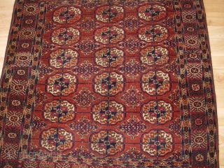 www.knightsantiques.co.uk 

Antique Tekke Turkmen rug of small size, with fine weave, superb colour.

Late 19th century.

Size: 5ft 0in x 3ft 9in (152 x 115cm).

This is an good example of a Tekke rug with  ...