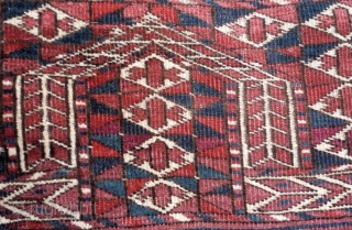 (37) Cherry-red Tekke Ensi (mihrab), 138 x 112, with a very cheery disposition. Plenty of turquoise and white as complimentary highlights, a close pile with very slight wear. Skirt is full of  ...