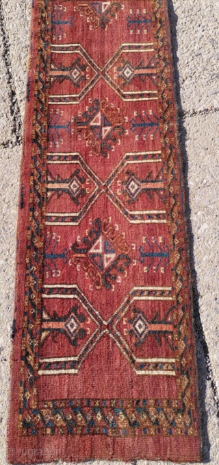 (BM)43 x 134 cm Ersari Torba, late 19th c. Great condition w/ slightly worn spots. Features 2 1/2 Dyrnak gül, lovely aubergine ground and the combination of elements is somewhat unusual.  