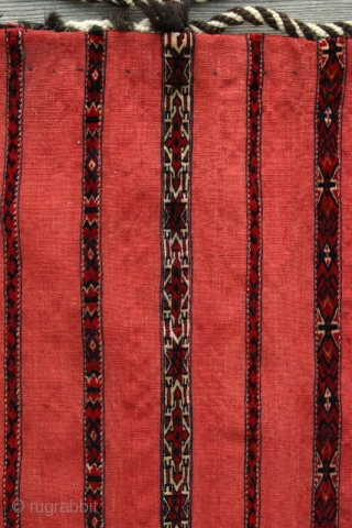 (11) Tekke Kizil Juval, 135 x 80 cm, 19th c. This big bedding bag has 9 finely and expertly knotted bands (two are white-grounded) on a blood-red, very robust flatweave with an  ...