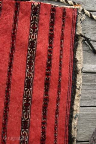 (11) Tekke Kizil Juval, 135 x 80 cm, 19th c. This big bedding bag has 9 finely and expertly knotted bands (two are white-grounded) on a blood-red, very robust flatweave with an  ...