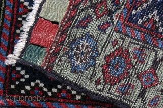 {89} 68 x 59 cm. Rare, green-border Afshar bag face. Full pile, cotton warp, double-wefted, good colors, selvage added. For sale at cost.
-Kolya          