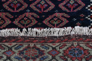 {89} 68 x 59 cm. Rare, green-border Afshar bag face. Full pile, cotton warp, double-wefted, good colors, selvage added. For sale at cost.
-Kolya          
