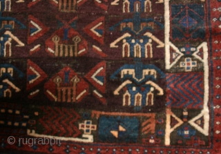 Rare, possibly unique Beludj, 212 x 106 cm., large tent rug with fine weave and strong color palette, featuring what appears to be a repeating architectural motif in the field and a  ...