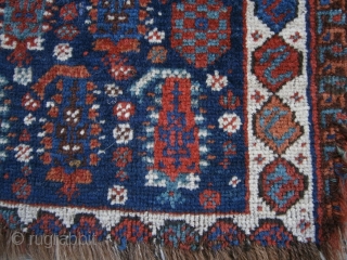 {87} Afshar bag face, 57 X 45 cm, with 19 Boteh (4/5/5/5) and dragon main border. Some lost pile at either end and damaged selvages, but field intact. Great dyes.
-Kolya   